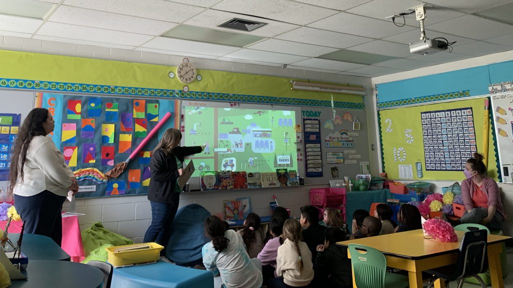 Jennifer Cox and Brittanie Parisien introducing students at Victor HL Wyatt School to digital agriculture using ozobots.